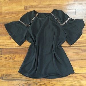 Short sleeve blouse with sleeve embellishment